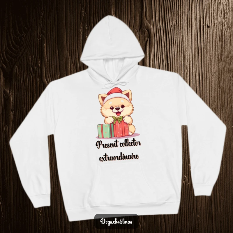 Funny Santa dog hoodie featuring a fluffy dog in a Santa hat, excitedly unwrapping a Christmas present, radiating holiday joy.