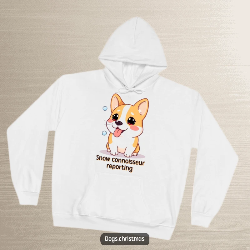 Funny hoodie depicting a Corgi dog comically trying to catch snowflakes on its tongue, perfect for cozy winter days.