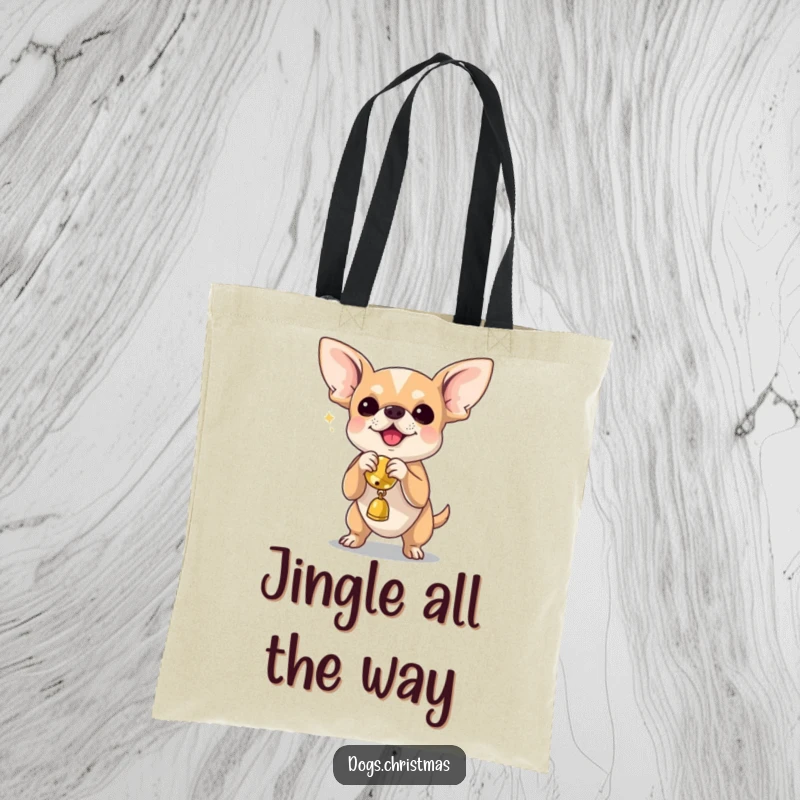 Funny chihuahua gleefully shaking a jingle bell toy, a durable and humorous tote bag for dog lovers.